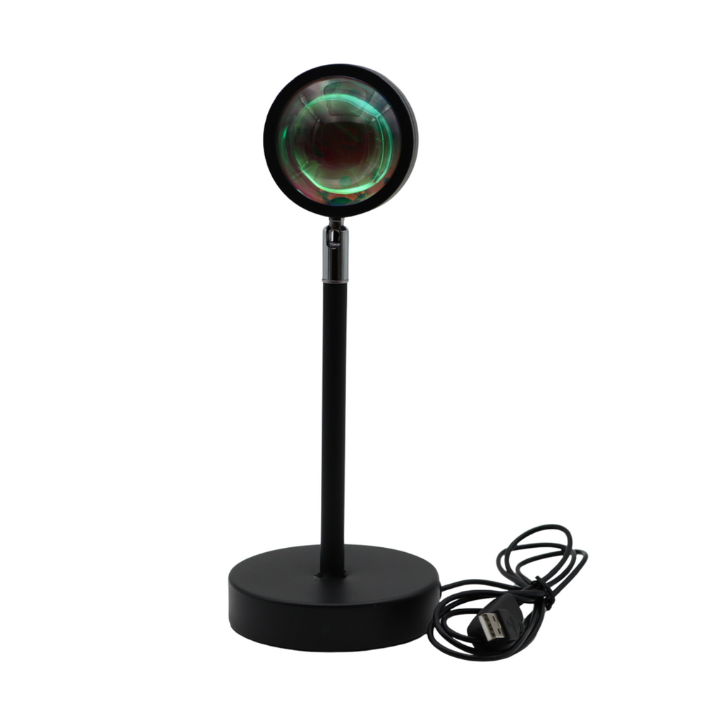 Schwarze LED-Sunset-Lampe mit rundem warmem Lichteffekt auf einem Tisch