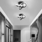 Moderne LED-Deckenleuchte mit verschlungenen Leuchtringen