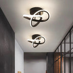 Moderne LED-Deckenleuchte mit verschlungenen Leuchtringen