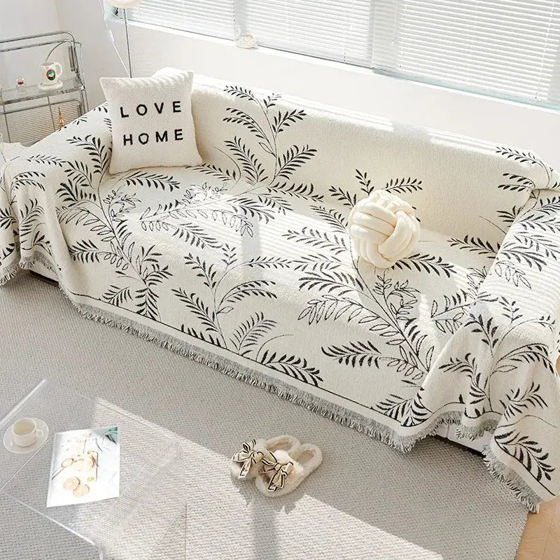 Sofadecke mit botanischem Jacquard-Blättermuster und Fransen