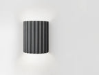 Riluma - Geriffelte Wandleuchte Auf-Ab Beleuchtet - Schwarz